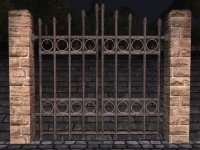 A Sandstone high iron fence gate